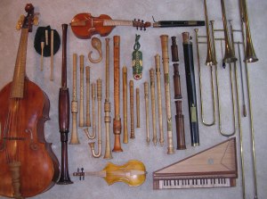 Some of the instruments played by the Oregon Renaissance Band. Top row, left to right: treble viol, alto curtal; 2nd row: bagpipe, gourd rattle, tartold, tenor alt rackett, tenor sackbutt, bass sackbutt, contrabass sackbutt; 3rd row: violone, tenor shawm, alto shawm, 2 schreierpfeiffen, 2 krummhorns, bass douçaine, 4 recorders, 3 cornamusen, bass Praetorius schreierpfeif, bass rackett, bass curtal; 4th row: great bass rackett; 5th row: viola da braccio, spinettino